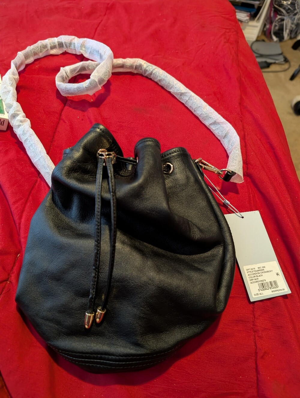 ANTONIO MELANI Black Leather Drawstring Crossbody Bag with Gold Hardware